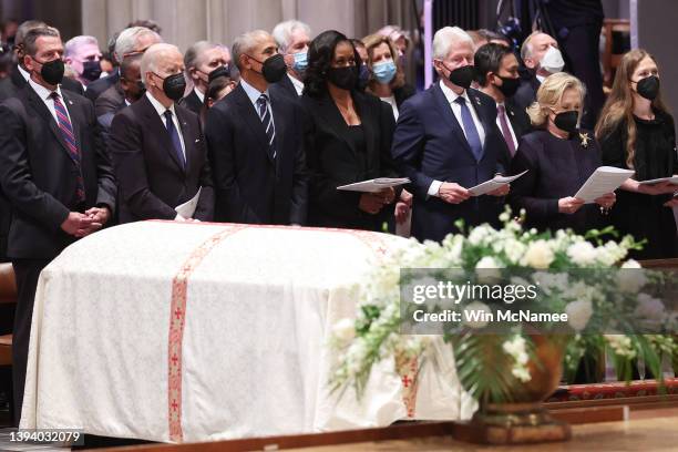 President Joe Biden, former U.S. President Barack Obama and former first lady Michelle Obama, former U.S. President Bill Clinton and his wife and...