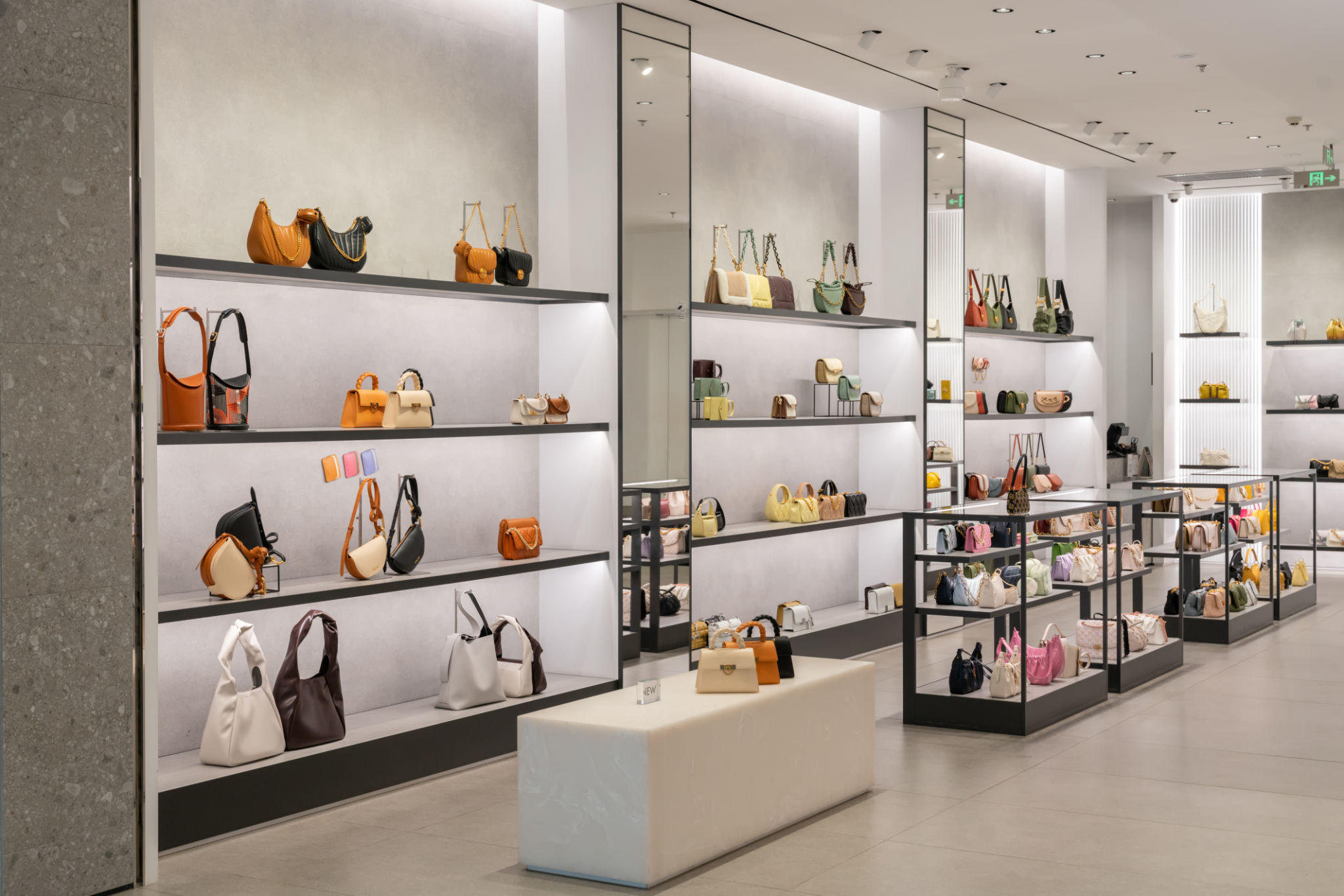 luxury fashion store front in modern shopping mall. luxury fashion store front in modern shopping mall.