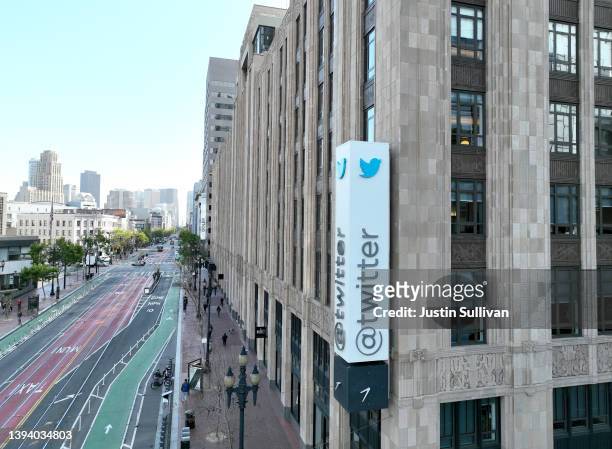 In an aerial view, a sign is seen posted on the exterior of Twitter headquarters on April 27, 2022 in San Francisco, California. Billionaire Elon...