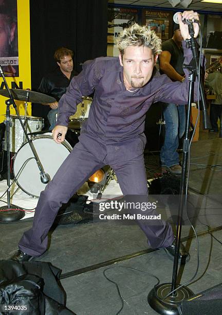 Actor Corey Feldman performs during his CD release party at Tower Records on September 18, 2002 in West Hollywood, California.