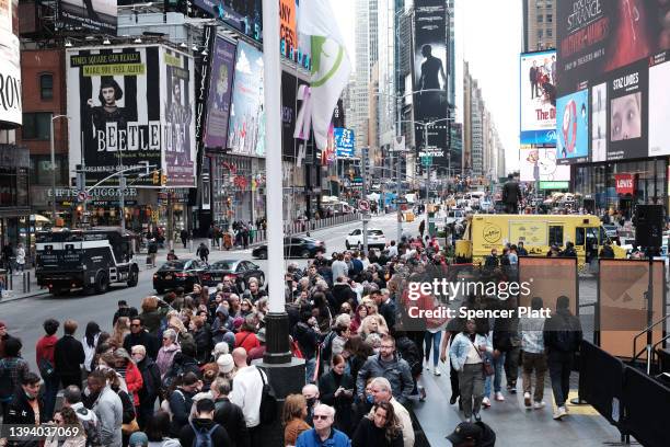 People wait in line to buy theater tickets in Times Square on April 27, 2022 in New York City. Unlike other parts of Manhattan, Times Square is...