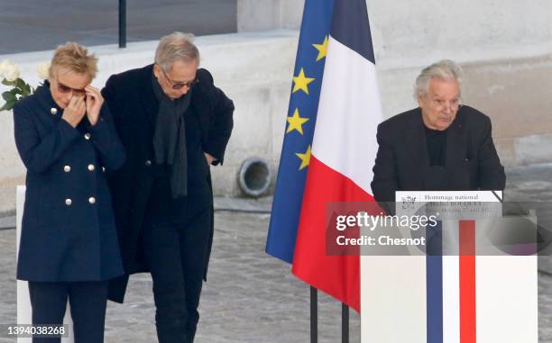 French actor Pierre Arditi flanked by French actress Muriel Robin and French actor Fabrice Luchini delivers a speech during a French national tribute...