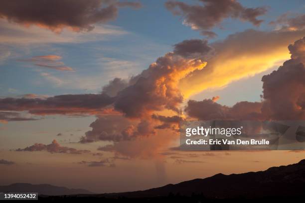 sunset clouds - eric van den brulle stock pictures, royalty-free photos & images