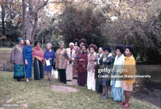 The participants of The Phillis Wheatley Poetry Festival standing in garden.