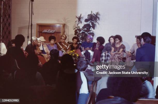 Participants attending a press conference during The Phillis Wheatley Poetry Festival.