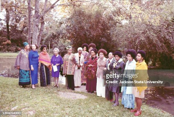 The participants of The Phillis Wheatley Poetry Festival standing in garden.