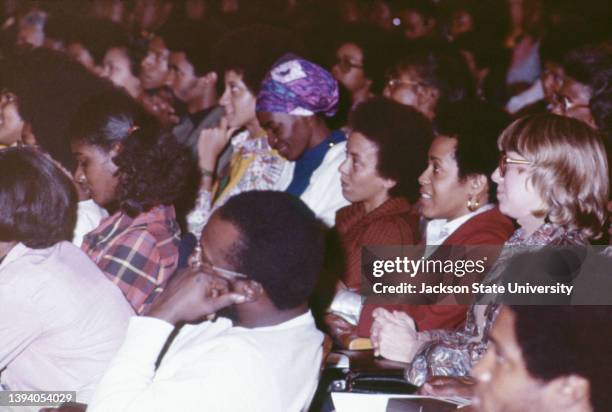 Nikki Giovanni and Paula Giddings sitting in the audience at The Phillis Wheatley Poetry Festival.