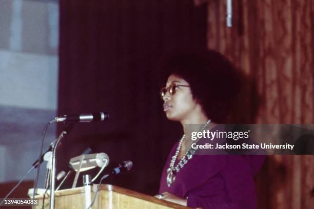 Alice Walker talking on microphone at The Phillis Wheatley Poetry Festival.