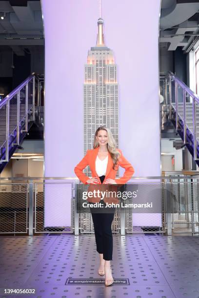 Allie LaForce lights up the Empire State Building orange for National Infertility Awareness Week at The Empire State Building on April 27, 2022 in...