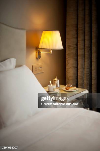 afternoon tea on the night table in hotel room - coffee cup light stock pictures, royalty-free photos & images