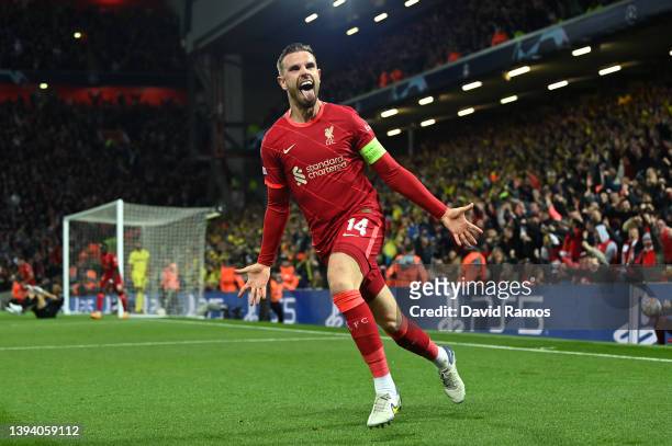 Jordan Henderson of Liverpool celebrates after their team's first goal which came through a Geronimo Rulli of Villarreal CF own goal during the UEFA...