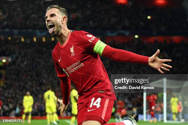 Jordan Henderson of Liverpool celebrates after their team's first goal which came through a Geronimo Rulli of Villarreal CF own goal during the UEFA...