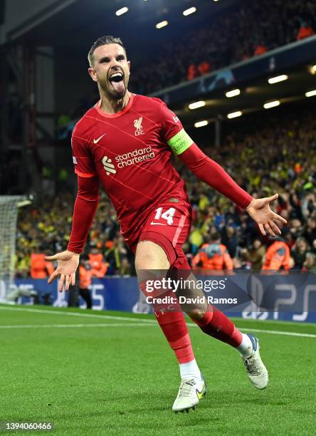 Jordan Henderson of Liverpool celebrates after their team's first goal which came through a Geronimo Rulli of Villarreal CF own goal during the UEFA...