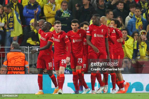 Sadio Mane of Liverpool celebrates with team mates after scoring their team's second goal during the UEFA Champions League Semi Final Leg One match...