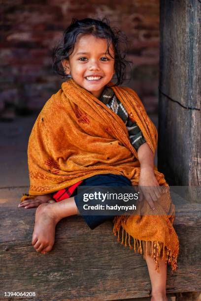 portrait of happy little nepali girl in bhaktapur, nepal - nepal child stock pictures, royalty-free photos & images