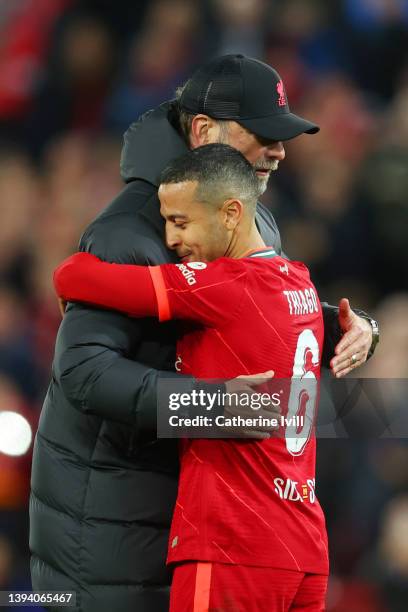 Juergen Klopp, Manager of Liverpool embraces Thiago Alcantara of Liverpool after the UEFA Champions League Semi Final Leg One match between Liverpool...