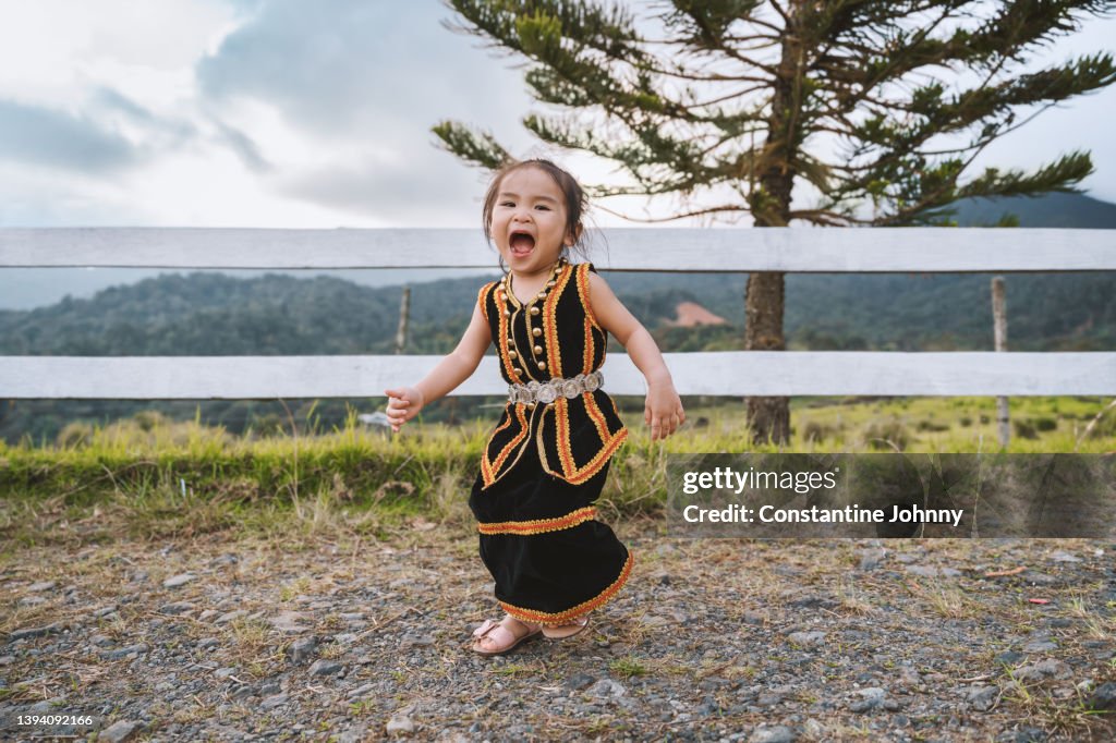Happy Little Toddler Girl Wearing Kadazan Dusun Traditional Costume