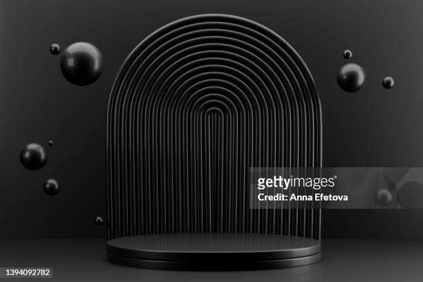 futuristic black podium with abstract striped backdrop and flying glass spheres on graphite background. modern 3d illustration for your products demonstrating - stereoscopic image stock pictures, royalty-free photos & images