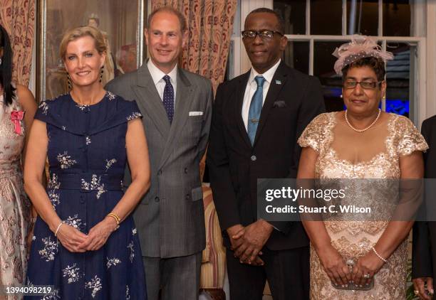 Sophie, Countess of Wessex and Prince Edward, Earl of Wessex pose with Philip Pierre, Prime Minister of Saint Lucia and guests during an investiture...