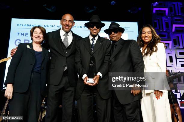 Sen. Amy Klobuchar, Harvey Mason jr., and Valeisha Butterfield Jones present an award to Honorees Jimmy Jam and Terry Lewis during the GRAMMYs On The...