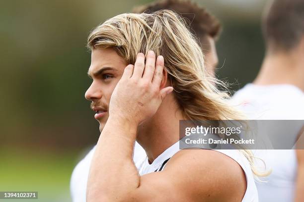 Bailey Smith of the Bulldogs looks on during a Western Bulldogs AFL training session at Whitten Oval on April 28, 2022 in Melbourne, Australia.
