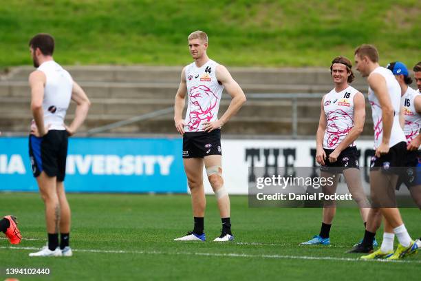 Tim English of the Bulldogs looks on during a Western Bulldogs AFL training session at Whitten Oval on April 28, 2022 in Melbourne, Australia.