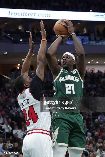 Jrue Holiday of the Milwaukee Bucks shoots over Javonte Green of the Chicago Bulls during the second half of Game Five of the Eastern Conference...