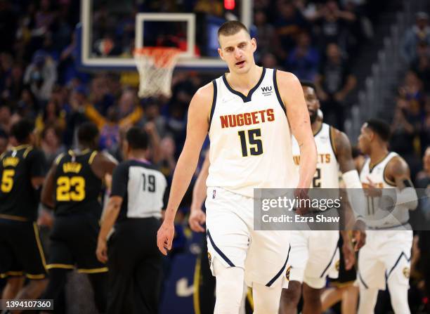 Nikola Jokic of the Denver Nuggets walks back to the bench during the first half of Game Five of the Western Conference First Round NBA Playoffs...