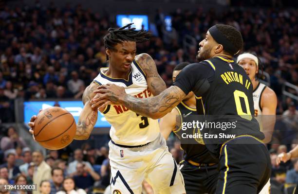 Bones Hyland of the Denver Nuggets is guarded by Gary Payton II of the Golden State Warriors during Game Five of the Western Conference First Round...