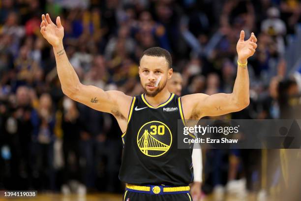 Stephen Curry of the Golden State Warriors reacts in the finals seconds of their victory over the Denver Nuggets in Game Five of the Western...