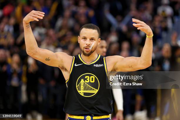 Stephen Curry of the Golden State Warriors reacts in the finals seconds of their victory over the Denver Nuggets in Game Five of the Western...