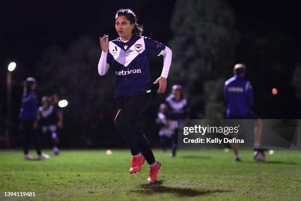 Montaha of the Melbourne Victory Afghan Women’s Team runs during a Melbourne Victory Afghan Women's Team Training Session at Robert Barrett Reserve...