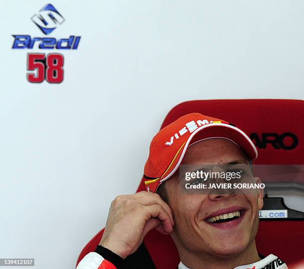 Viessmann Kiefer Racing's German Stefan Bradl smiles in the pits during Moto2's third practice session of Valencia's MotoGP Grand Prix at Ricardo...