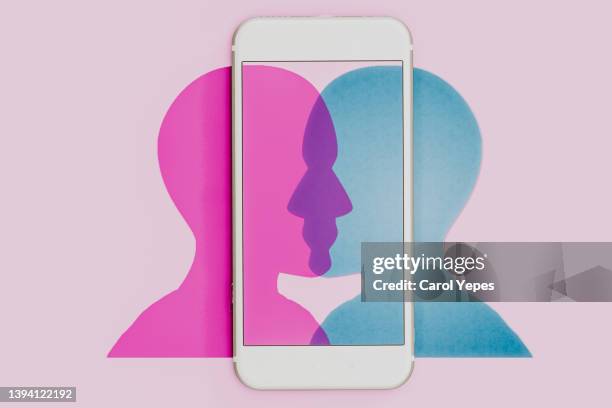 digital and mobile communication concept, friends chatting  icon on mobile.. - flirting imagens e fotografias de stock