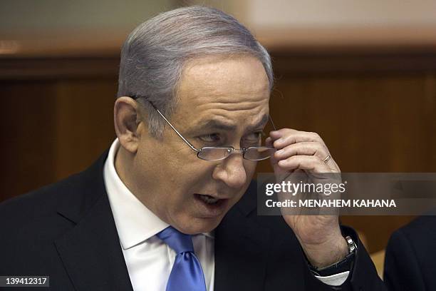 Israeli Prime Minister Benjamin Netanyahu addresses the weekly cabinet meeting in Jerusalem on January 9 one day after the Israeli premier's office...