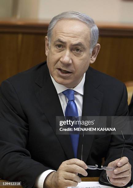 Israeli Prime Minister Benjamin Netanyahu addresses the weekly cabinet meeting in Jerusalem on January 9 one day after the Israeli premier's office...