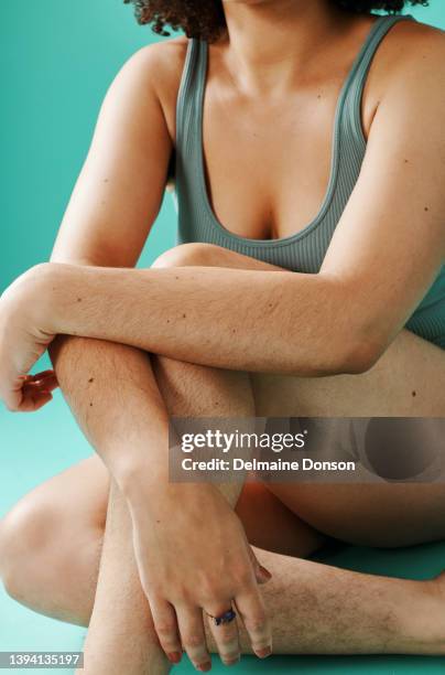 unknown mixed race model showing legs in the studio - hairy women imagens e fotografias de stock