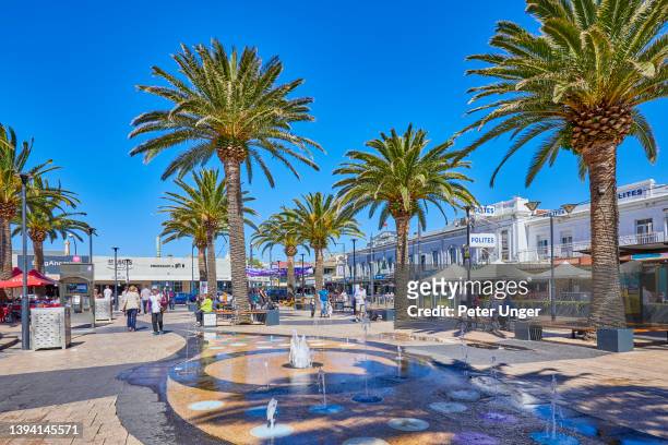 tourist strip and shopping area at beachside in the township of  glenelg , adelaide, south australia, australia - shopping mall adelaide fotografías e imágenes de stock