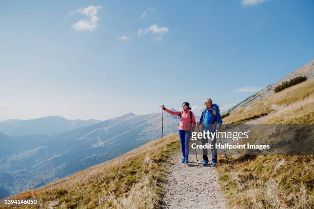 senior couple hiking together. - sports top view ストックフォトと画像