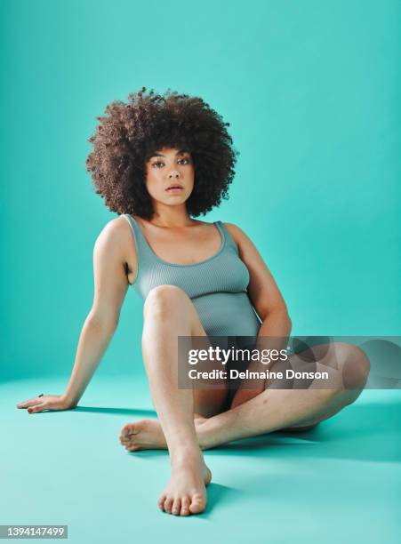 full body model sitting in studio and posing - black hairy women bildbanksfoton och bilder