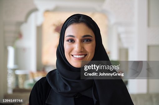 Headshot of early 20s Middle Eastern woman Headshot of early 20s Middle Eastern woman