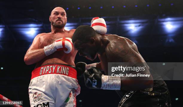 Tyson Fury and Dillian Whyte in action during the WBC World Heavyweight Title Fight between Tyson Fury and Dillian Whyte at Wembley Stadium on April...