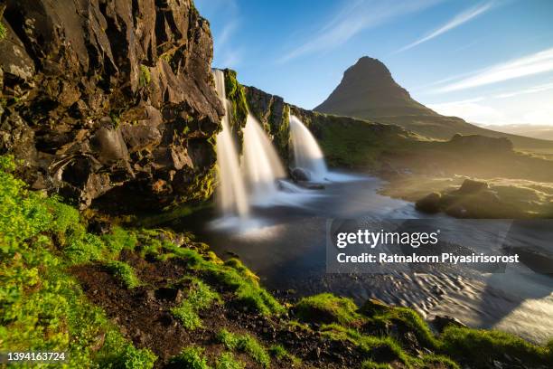 kirkjufell and waterfall at sunrise in iceland. beautiful landscape. - gullfoss falls stock pictures, royalty-free photos & images