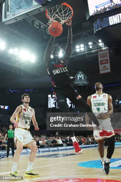 Jo Lual-Acuil Jr of United slam dunks during game one of the NBL Semi Finals series between Melbourne United and Tasmania JackJumpers at John Cain...