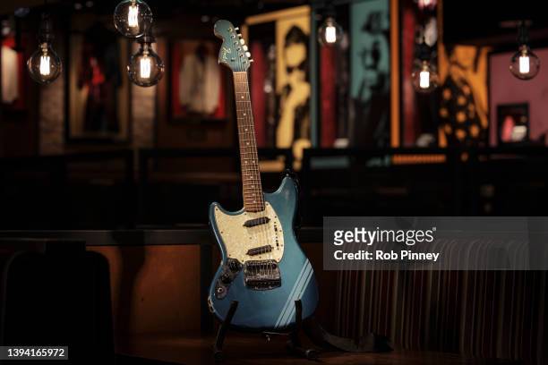 Kurt Cobain's 1969 Fender Mustang electric guitar photographed at Hard Rock Cafe on April 28, 2022 in London, England. Items including Kurt Cobain's...