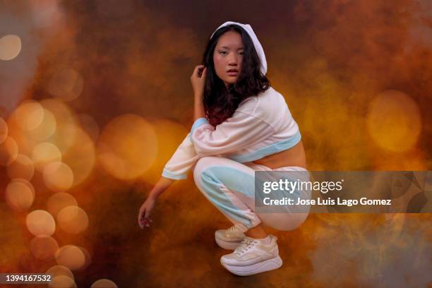 young asian ethnian woman with urban style - alicante street stock pictures, royalty-free photos & images