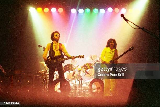Eric Bloom, drummer Albert Bouchard and Buck Dharma of American rock band Blue Oyster Cult perform on stage at Hammersmith Odeon on May 4th, 1978 in...