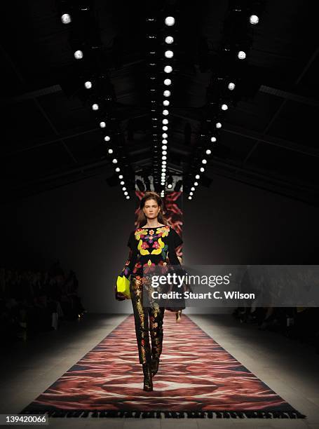 Model walks the runway during the Osmanshow at London Fashion Week Autumn/Winter 2012 at Somerset House on February 20, 2012 in London, England.