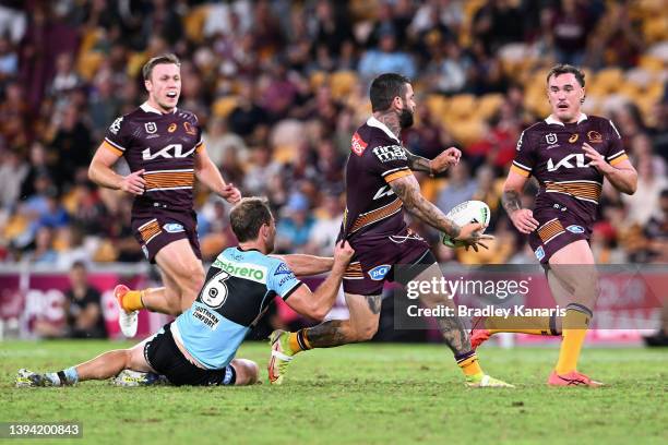 Adam Reynolds of the Broncos passes during the round eight NRL match between the Brisbane Broncos and the Cronulla Sharks at Suncorp Stadium, on...