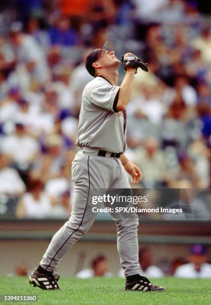 Billy Wagner of the Houston Astros celebrates a save at the end of a game from his 1999 season against the Chicago Cubs at Wrigley Field in Chicago,...